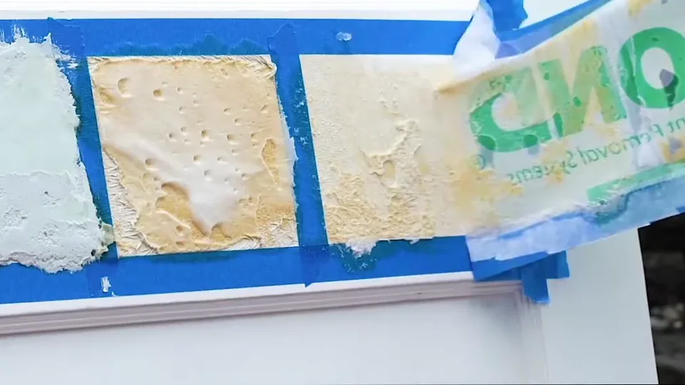 Laminated paper lifted to reveal softened coating