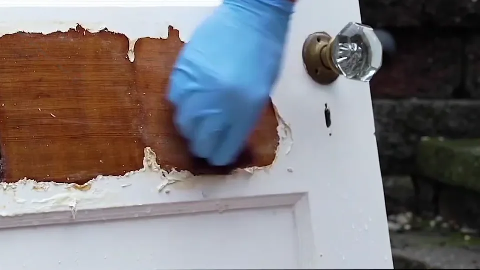 Test area scrubbed with water and a pad after removal